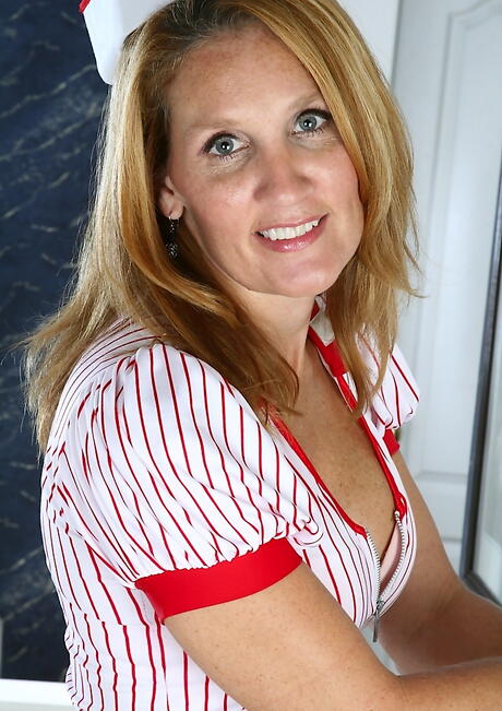 Very attractive mature Lilly reveals big tits and hot butt 