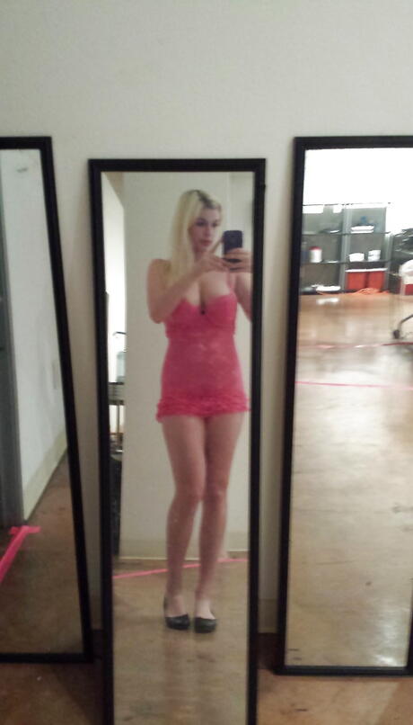 Very attractive babe Danielle Delaunay in fancy skirt baring big boobs and sexy ass 